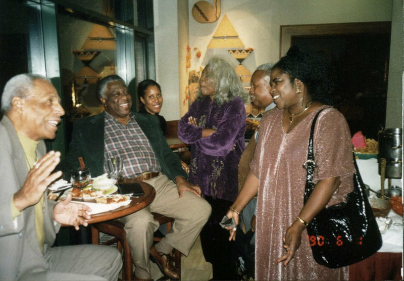 Tess Onwueme with playwrights Ed Bullins and Woodie King Jr., Director Abena Joan Brown and playwright Parker, Chicago, 1995.